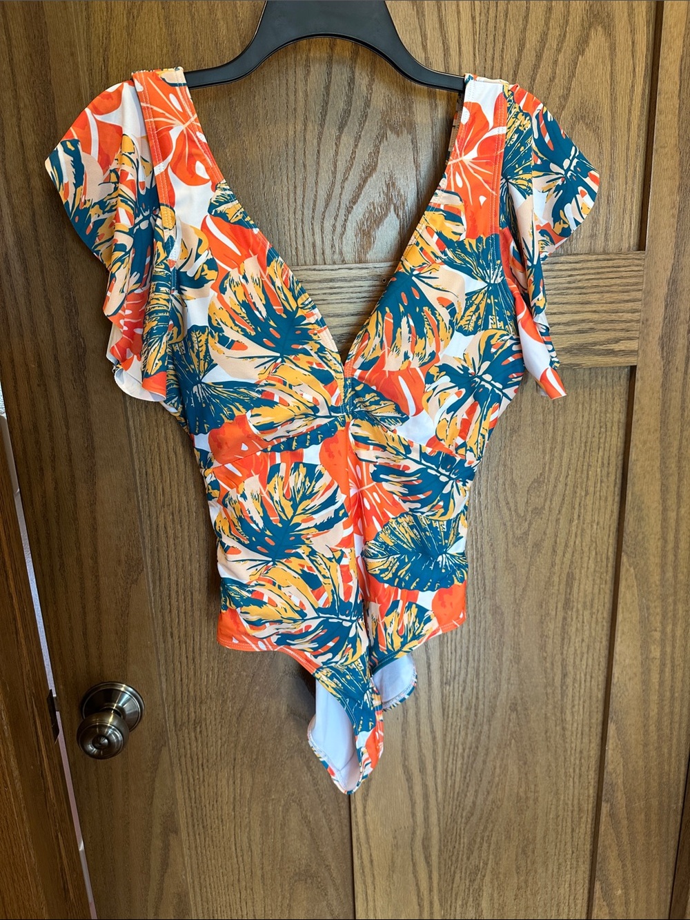 V neck ruffle one piece swimsuit, floral print with belt.